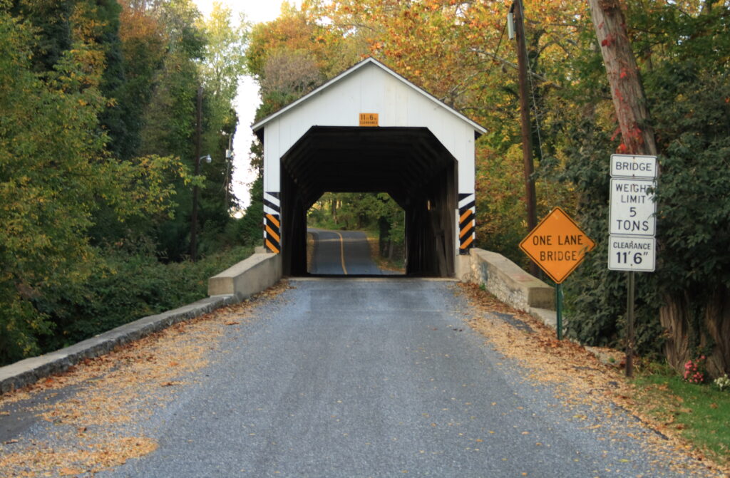 a covered bridge. September 2023 news brief