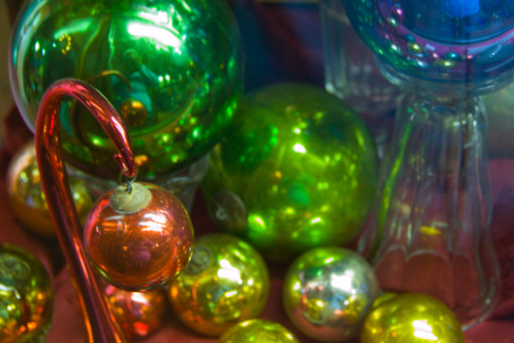 Colorful vintage Christmas ornaments.  December 2023 News Brief.